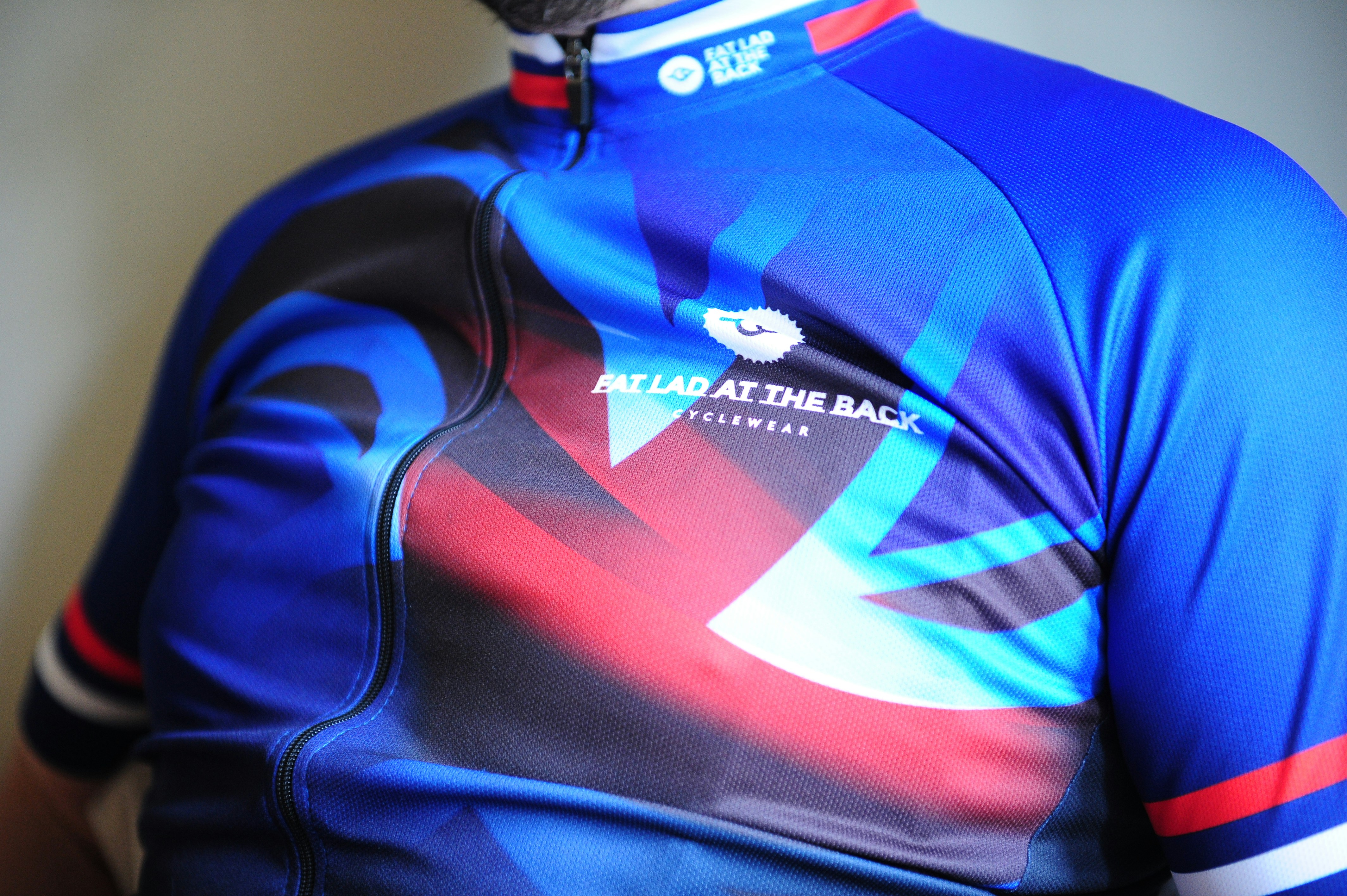 blue and orange adidas shirt