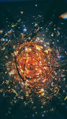 Copper wire coils glowing with a warm metallic hue.