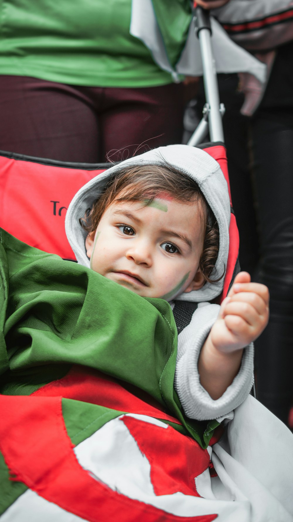 girl in green and white hoodie