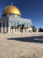 white and blue dome building under blue sky during daytime