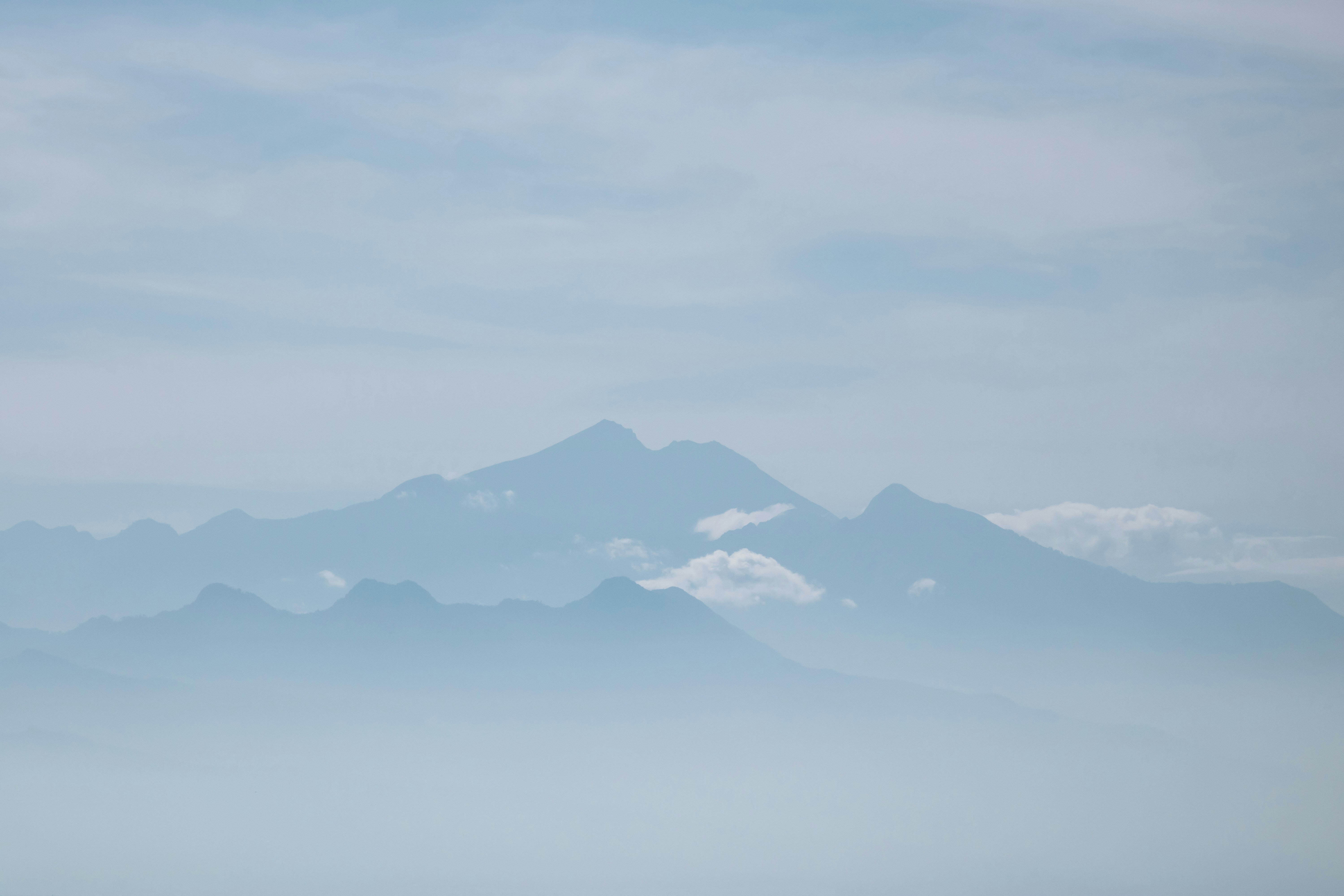 black mountains under white sky during daytime
