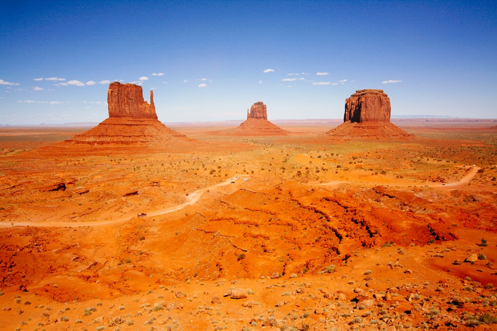 brown rocky mountain under blue sky during daytime