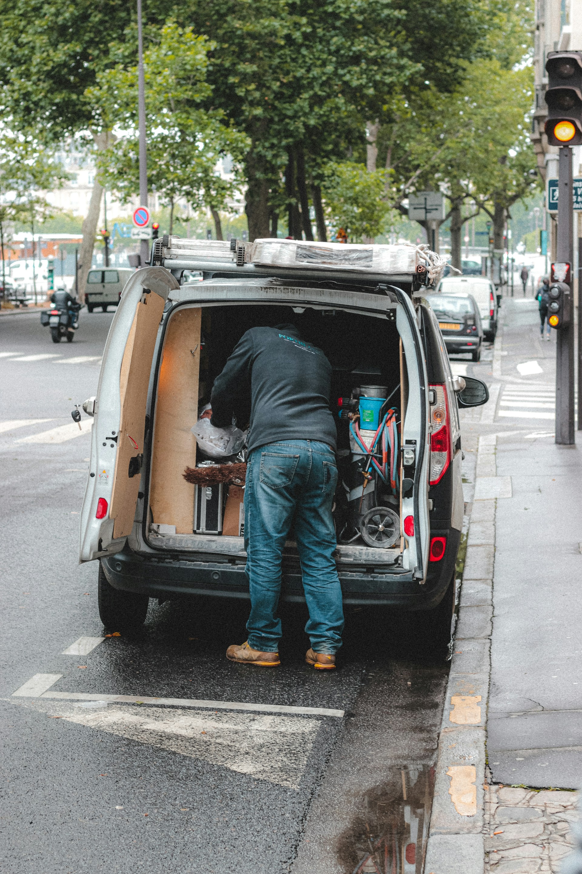 woman wearing yellow long-sleeved dress under white clouds and blue sky during daytime