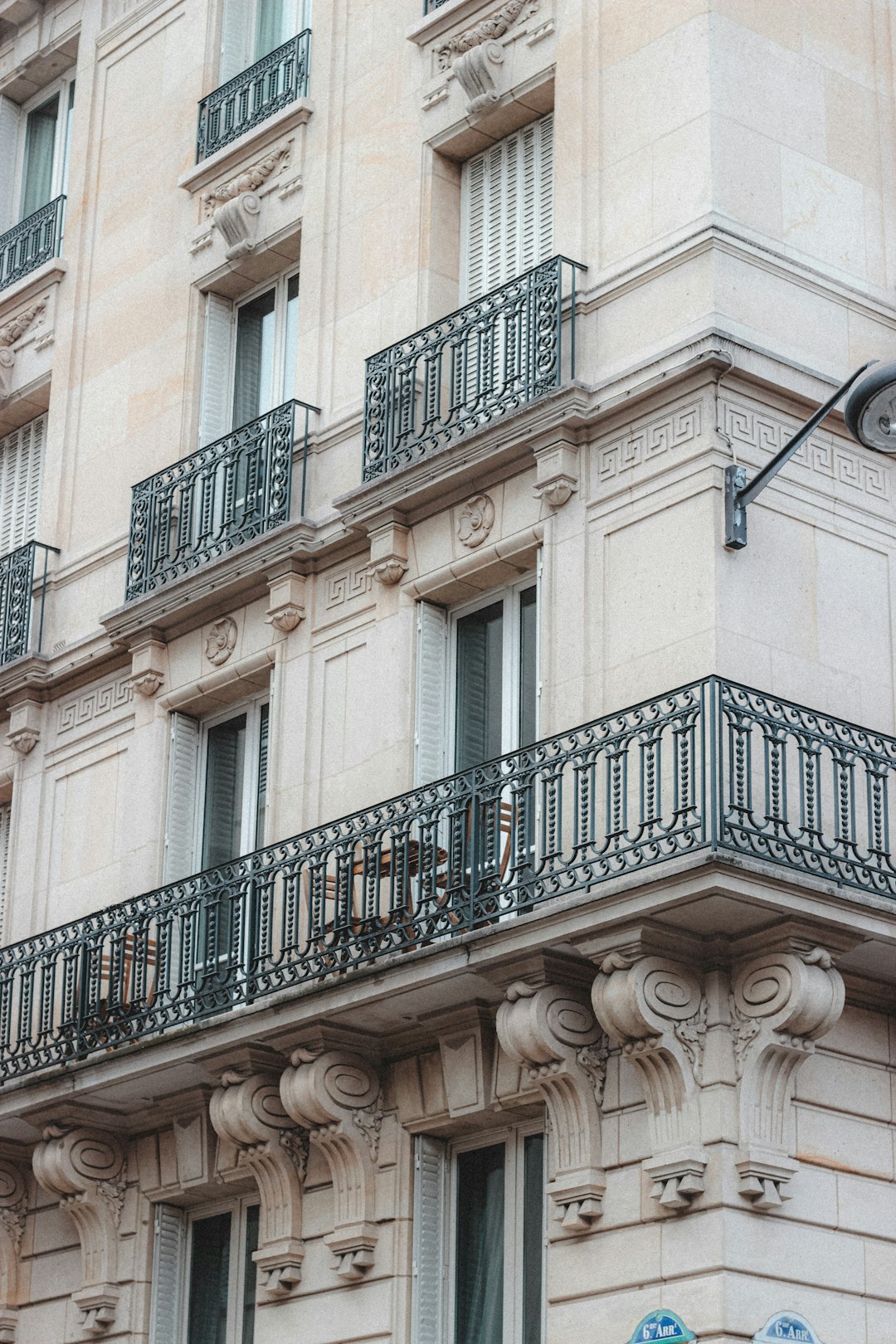 black metal railings on brown concrete building