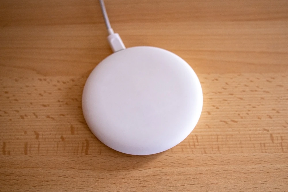 White circular wireless charging pad