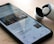 A smartphone on a wooden surface displays a Google News app with an article about George Floyd. Next to the phone, there is a pair of wireless earbuds in a partially opened charging case.