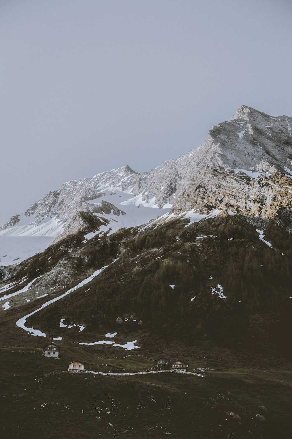 snow covered mountain during daytime