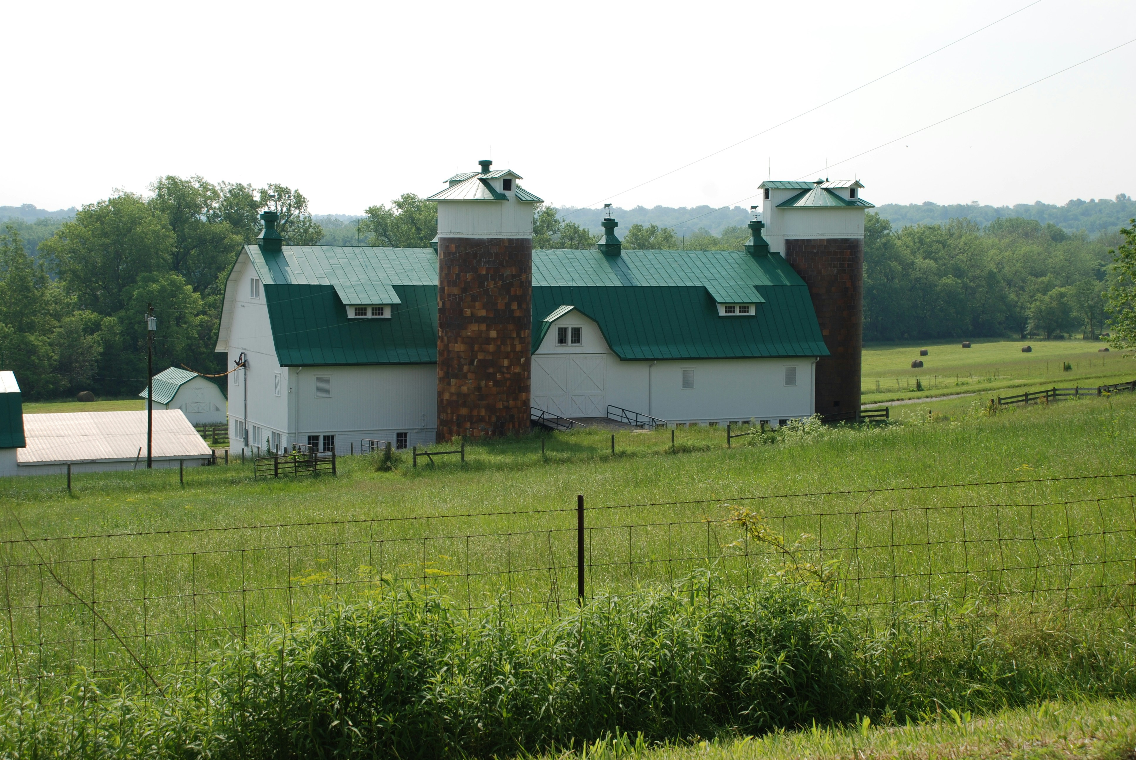 Historic old barn with unusual Silos with windows