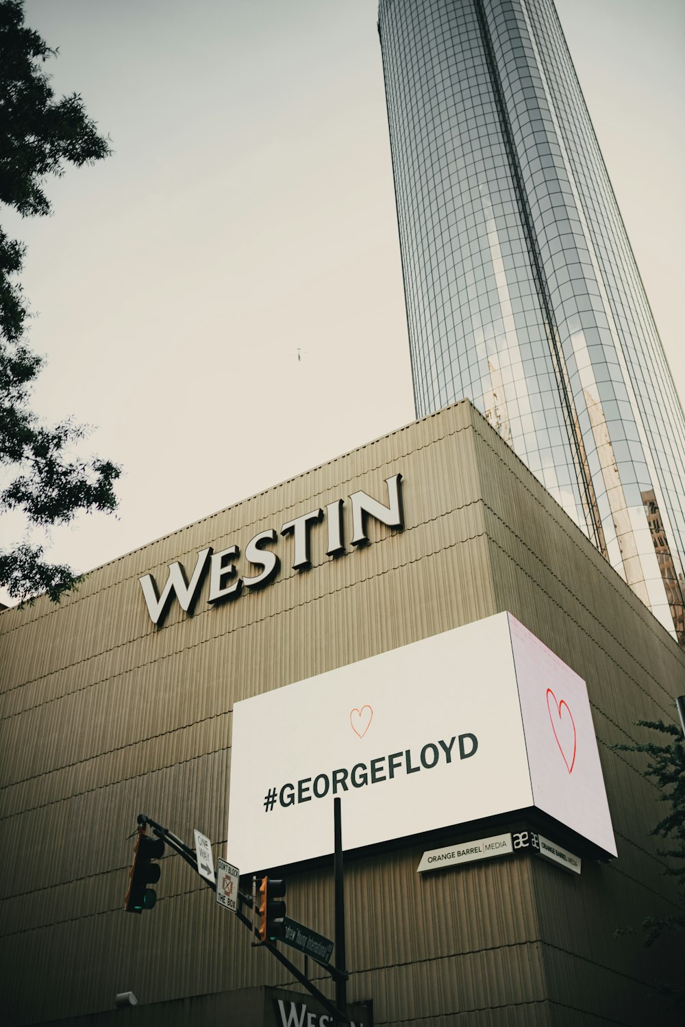 a tall building with a large sign on it's side