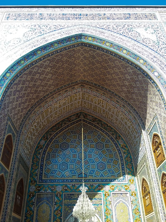 brown and green floral dome building in Mashhad Iran