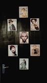 A collection of magazine covers is displayed on a dark wall, each featuring a different portrait of a person. The covers are from well-known fashion magazines such as Vogue, Grazia, and Elle. The arrangement is aesthetically pleasing and suggests a focus on fashion and style.
