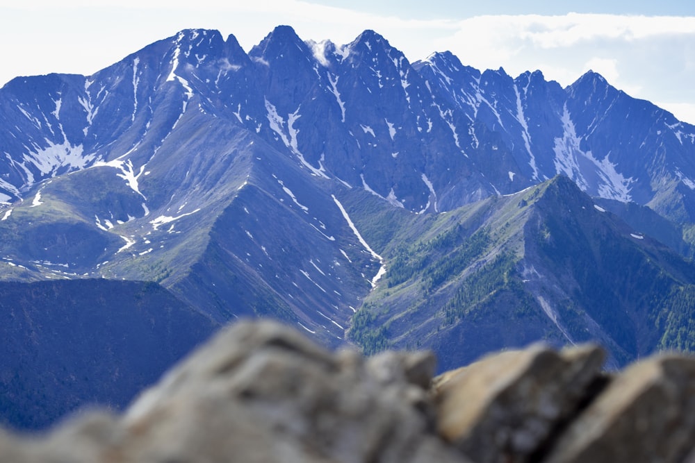 gray and white mountain under blue sky during daytime