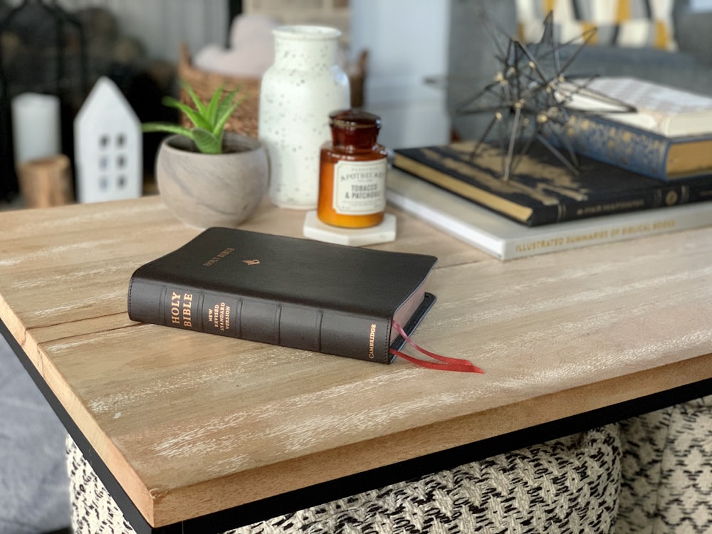 black and orange box mod on brown wooden table