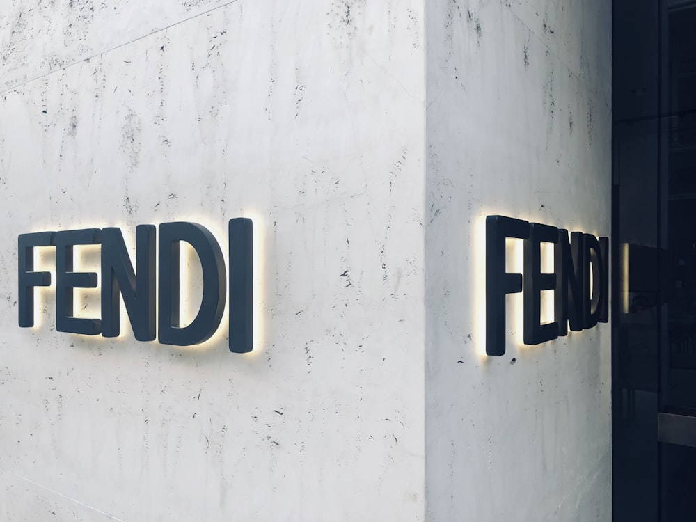 a building that has a sign that says fendi on it
