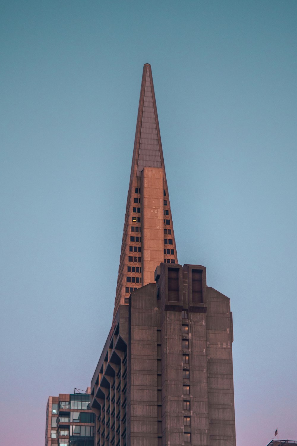 brown concrete building under blue sky during daytime