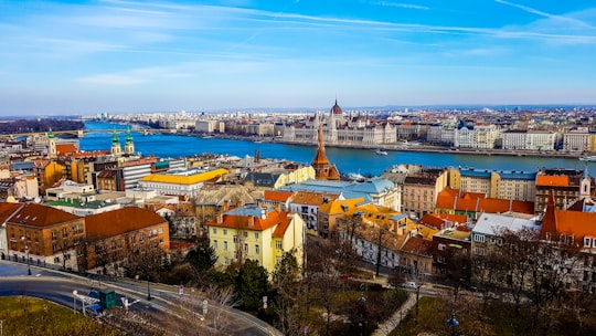 aerial view of city buildings during daytime in Hungarian Parliament Building Hungary