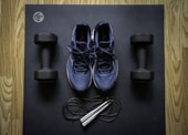 blue and black nike athletic shoes