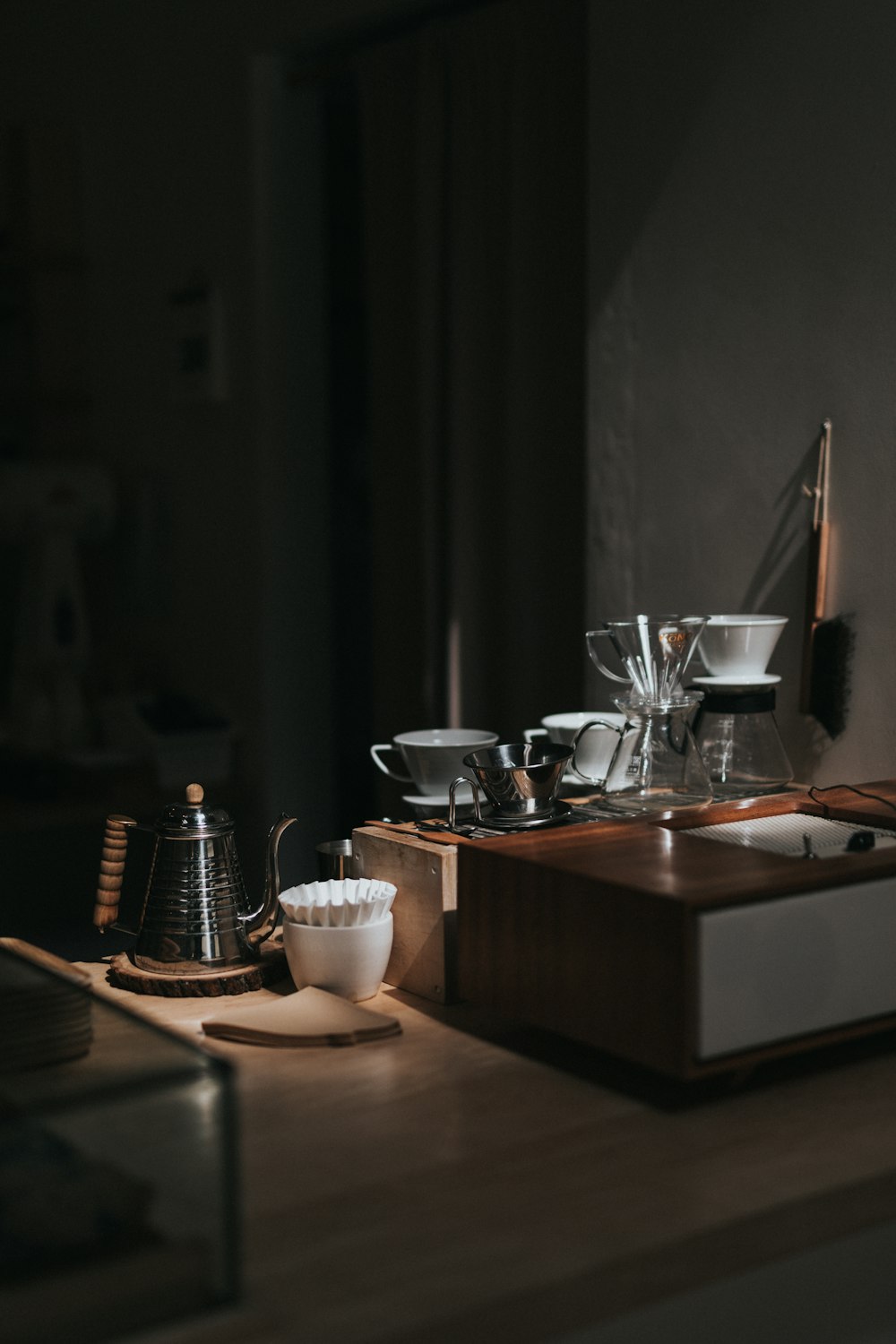 white ceramic teacup on brown wooden table