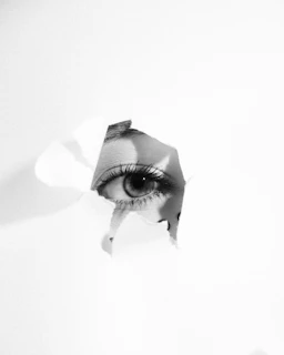 grayscale photo of mans face