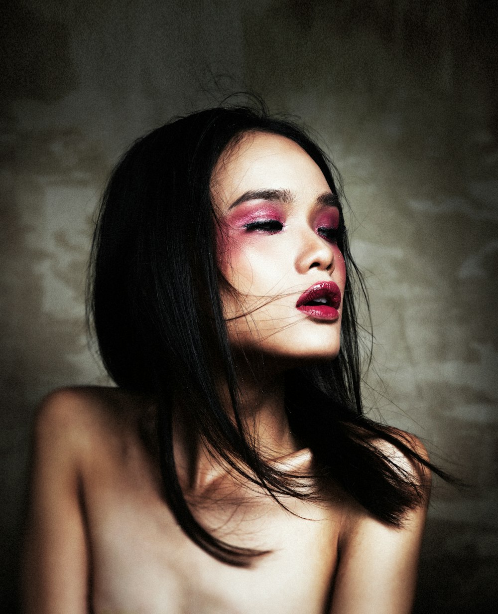 topless woman with red lipstick