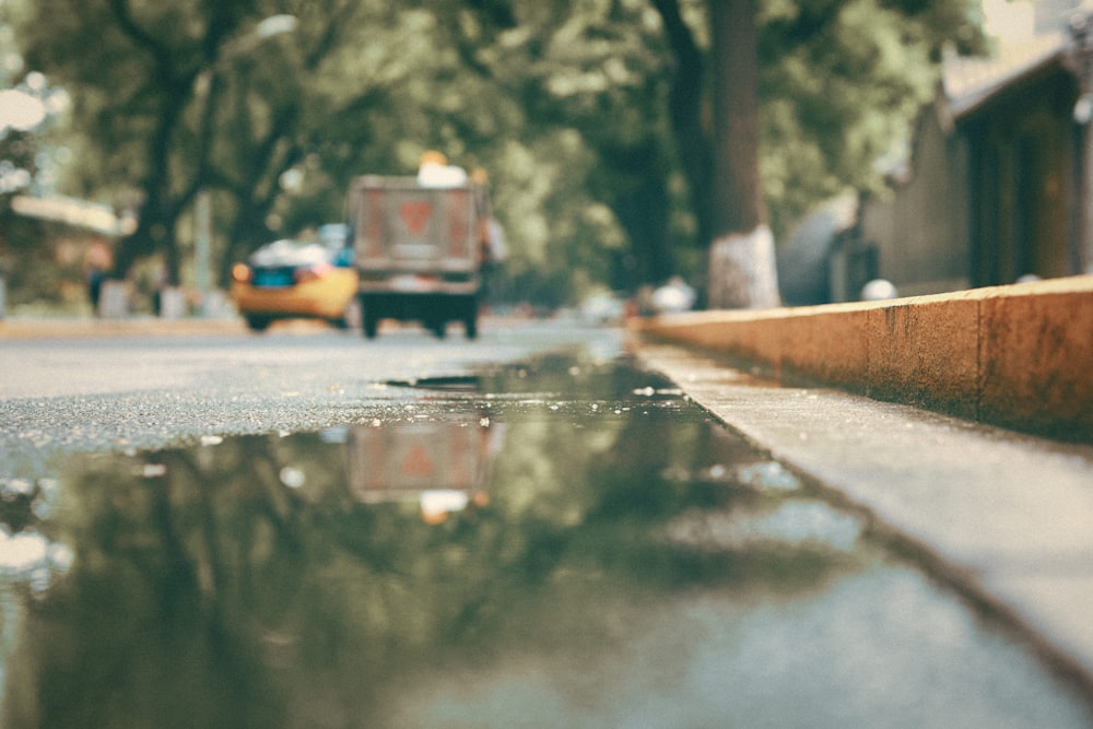 yellow car on road during daytime