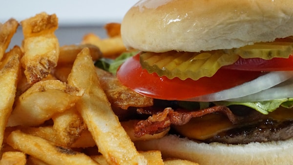 Burger with fries and tomato sauce