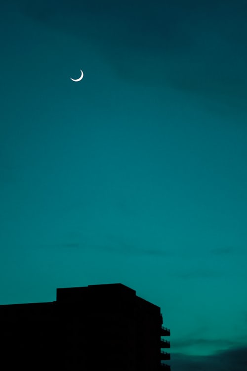 blue aesthetic sky with moon wallpaper