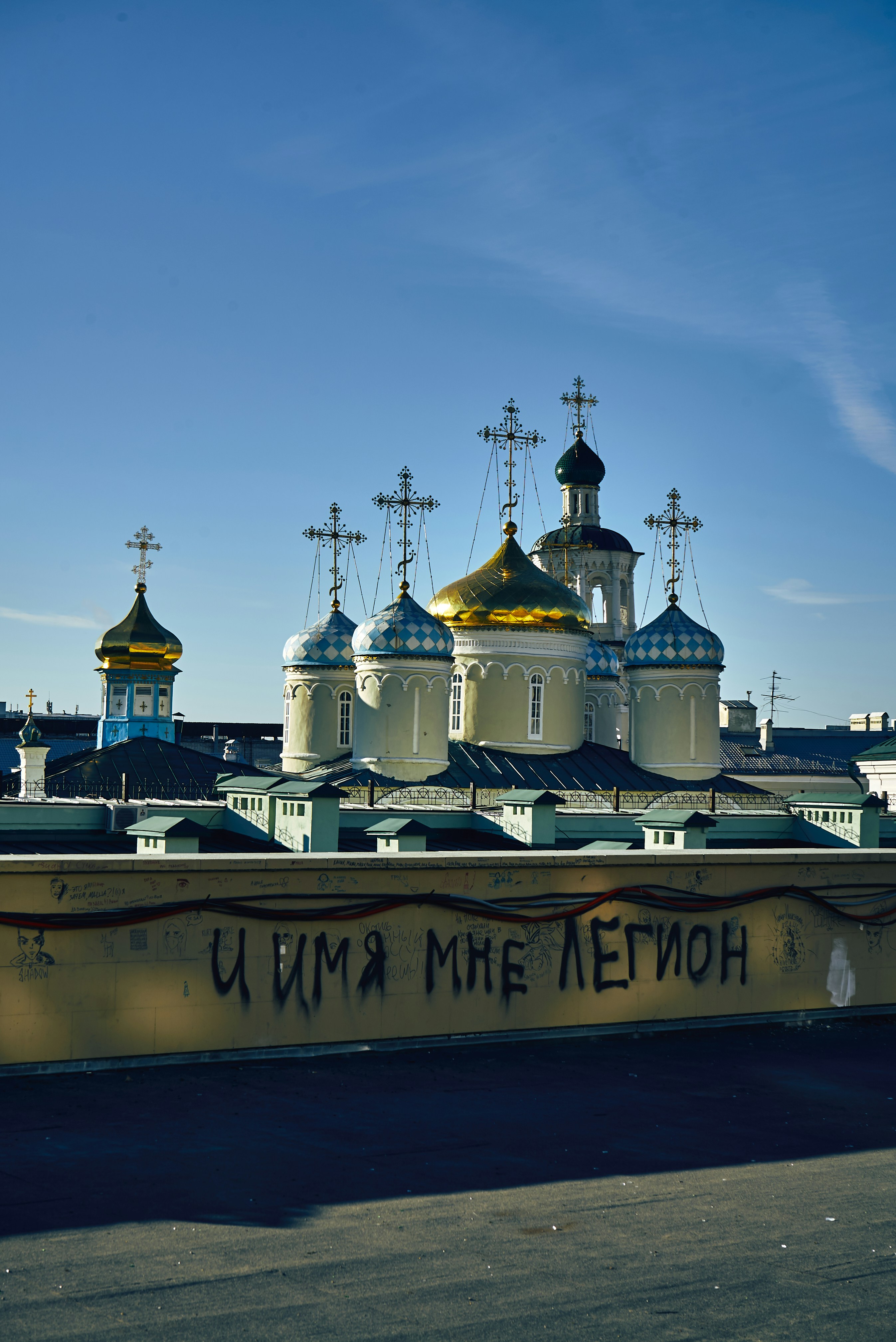 white and gold concrete building under blue sky during daytime
