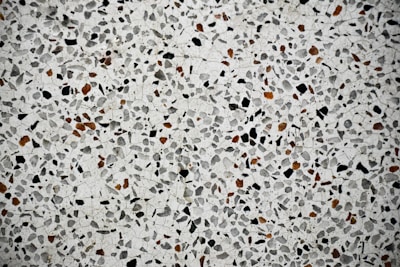 Close-up of textured terrazzo flooring showcasing mixed aggregate materials.
