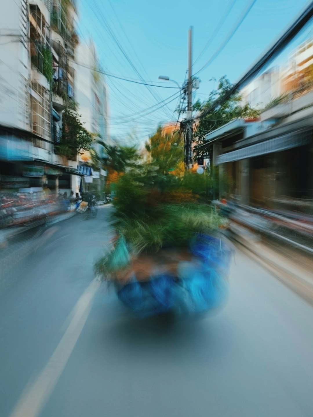 blue car on road during daytime