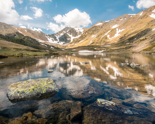 lake in the middle of mountains in Pic Carlit France