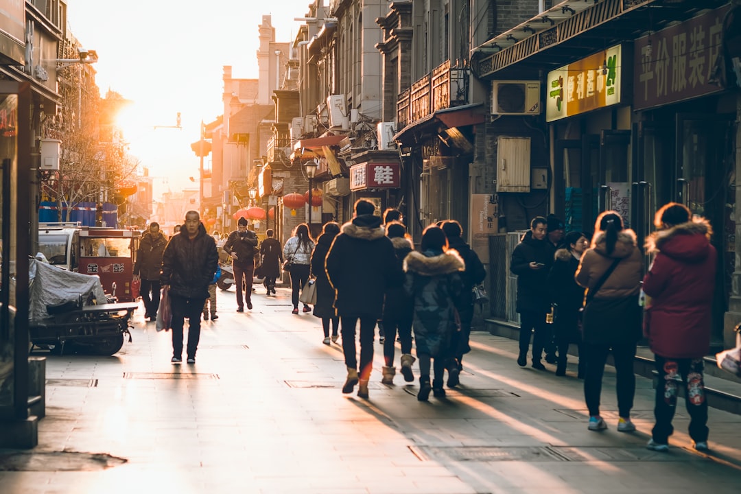 people walking on street during daytime