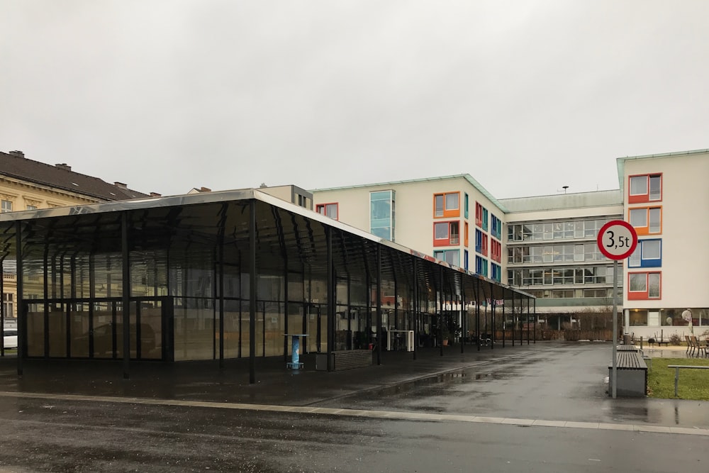 white and brown concrete building under white sky during daytime