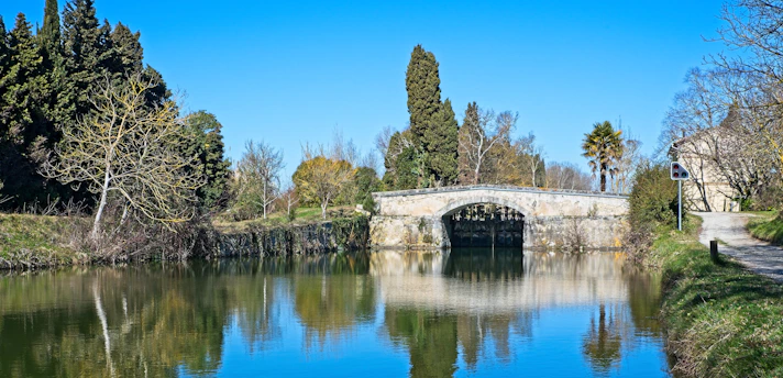 white concrete bridge over river