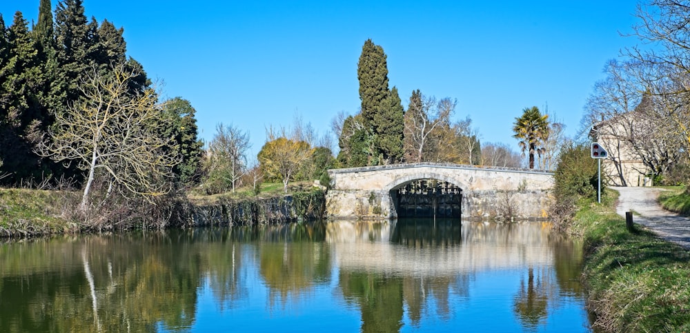 white concrete bridge over river