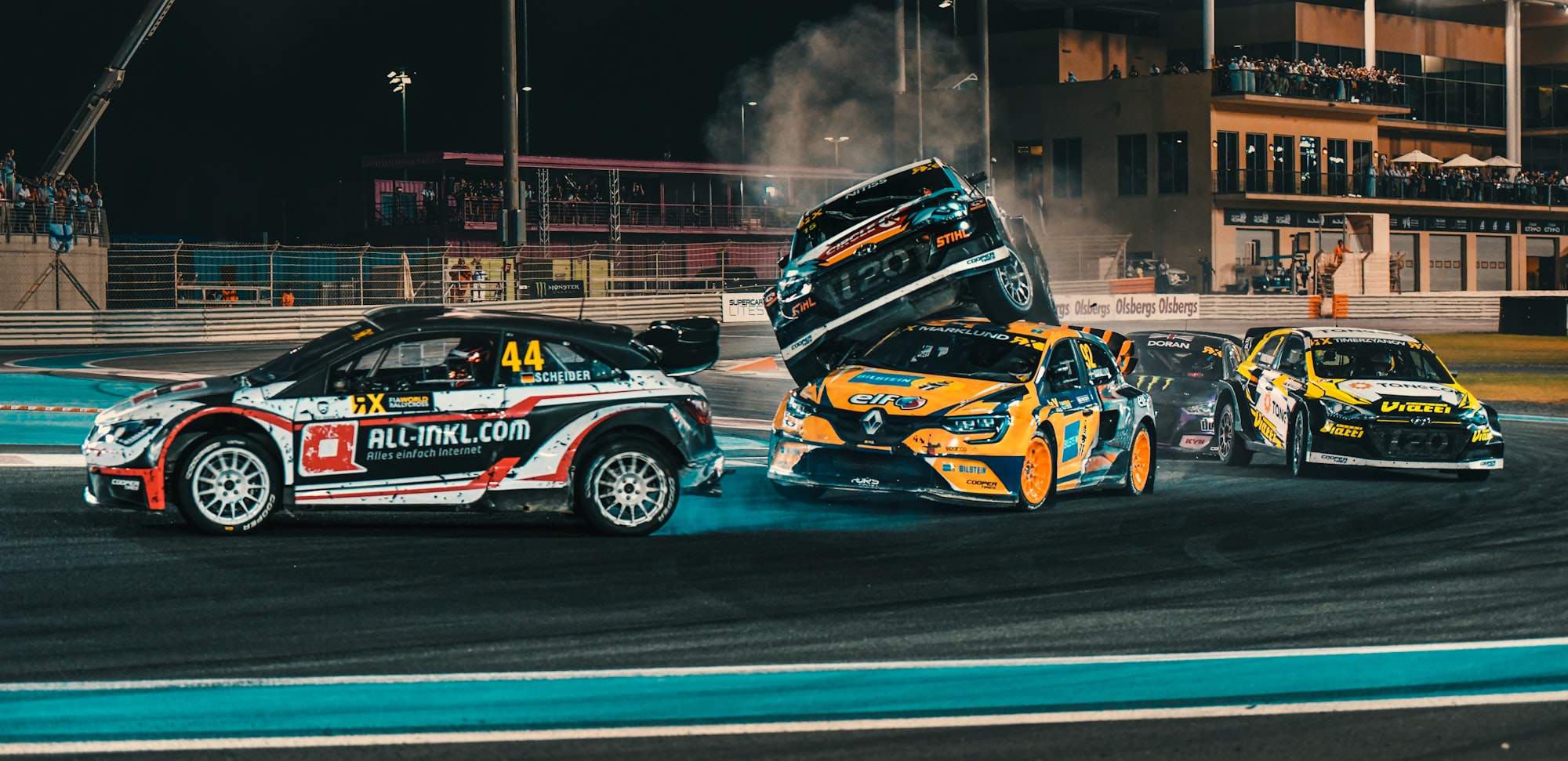 A car crashes into another on a turn at the Abu Dhabi WRX, 2019. 