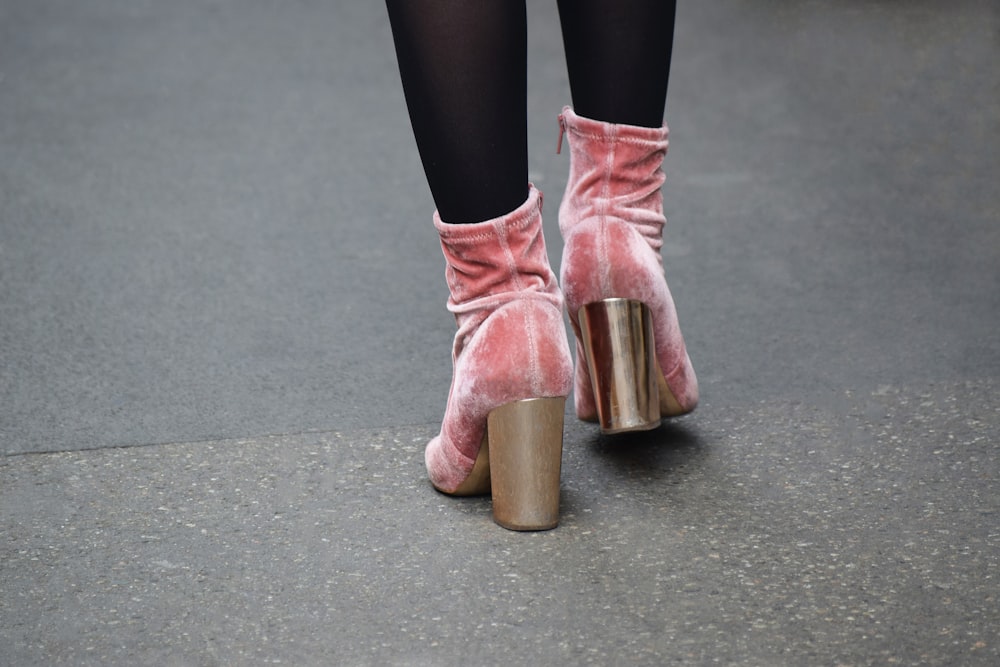 woman in pink leather boots
