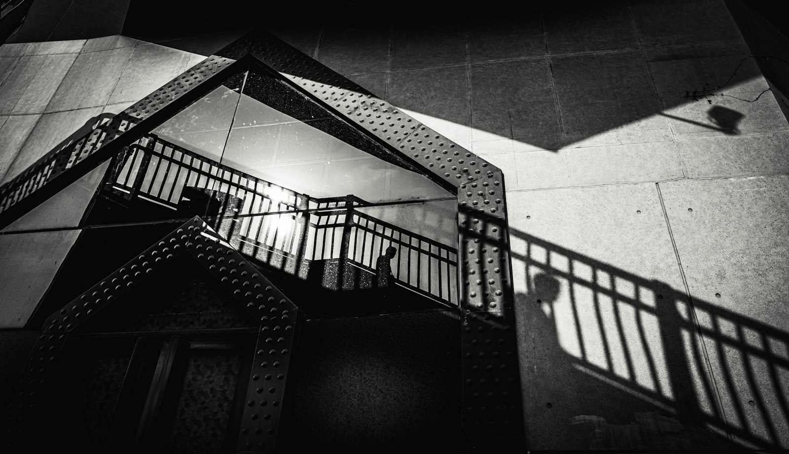 Sony FE 20mm F1.8G sample photo. Black metal staircase on photography