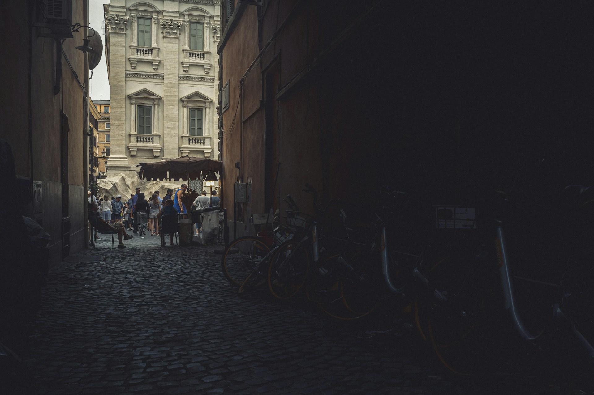 bicycles parked on sidewalk near building during daytime