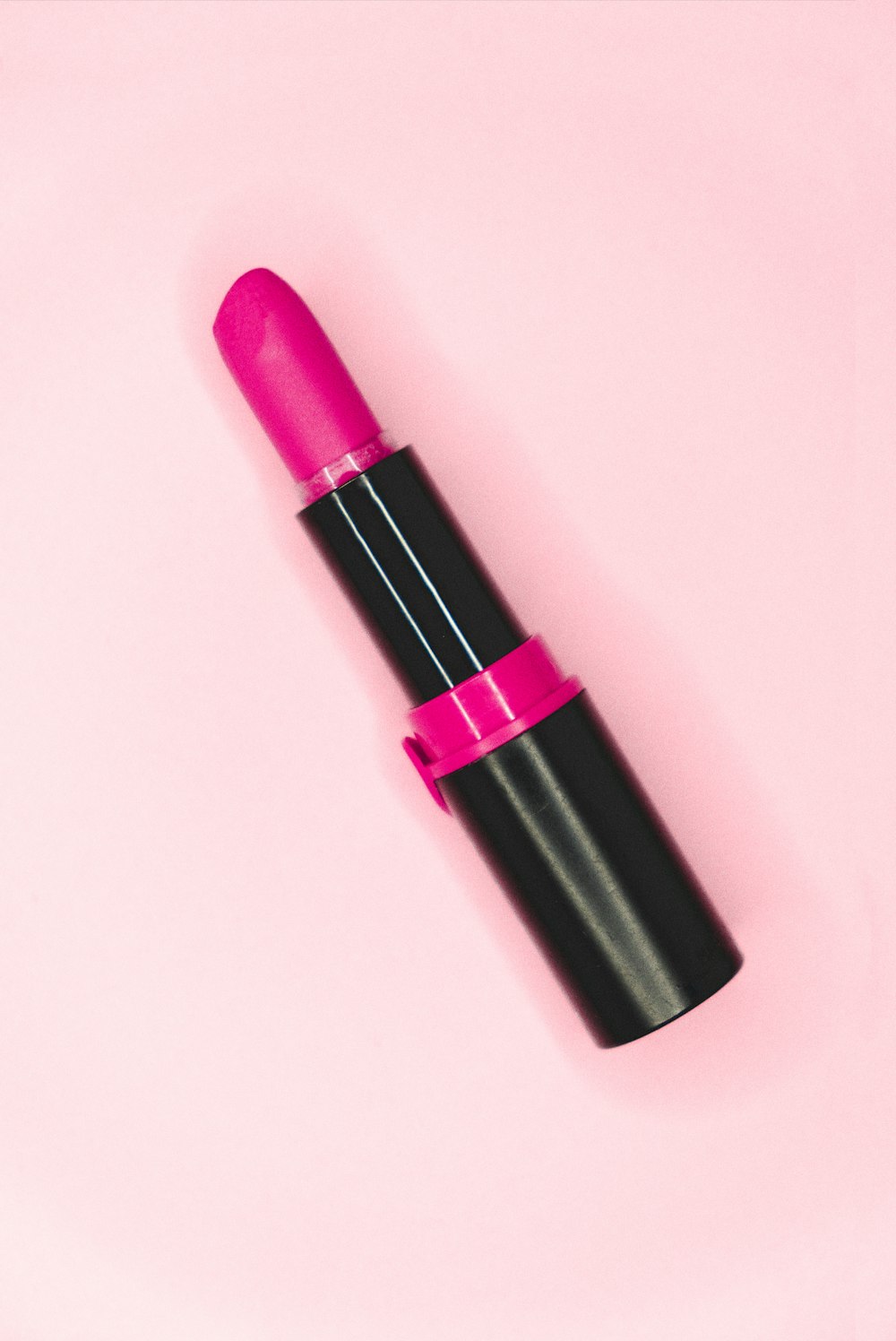 pink lipstick on pink surface
