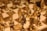 A close-up of intricately designed chess pieces with a focus on golden figures representing royalty and knights. The chessboard is elegant, with detailed craftsmanship on the pieces, highlighting a sense of luxury and historical significance.