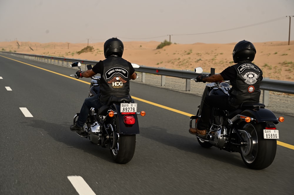 black and red motorcycle on road during daytime