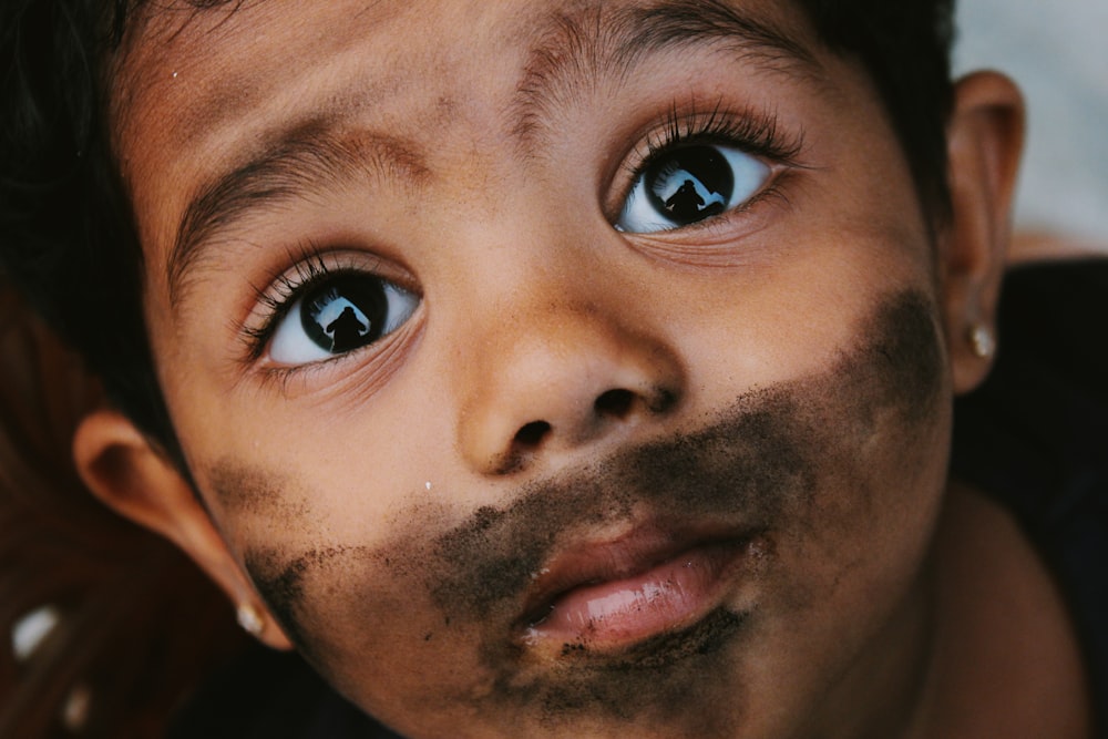 boys face with blue eyes