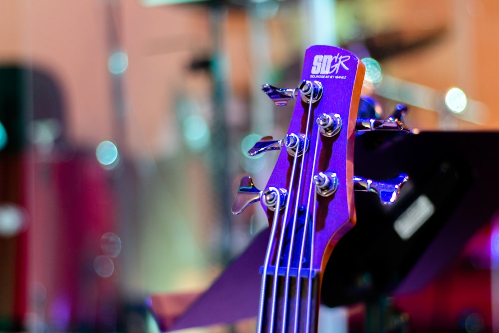 purple and black guitar headstock