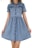 A denim dress with short sleeves and a button-down front. The dress has two chest pockets and a flared, gathered skirt. The denim is a light blue color and the fabric appears soft.
