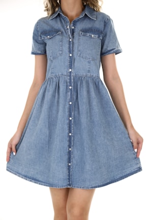 A denim dress with short sleeves and a button-down front. The dress has two chest pockets and a flared, gathered skirt. The denim is a light blue color and the fabric appears soft.