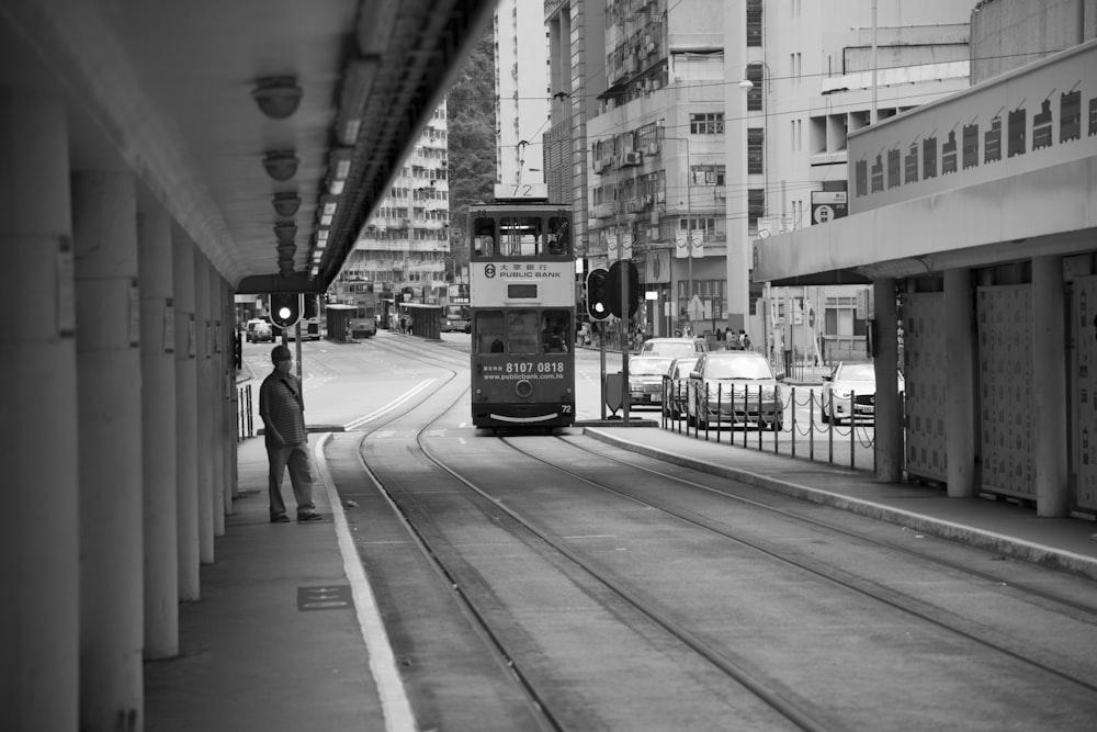 grayscale photo of train on rail road