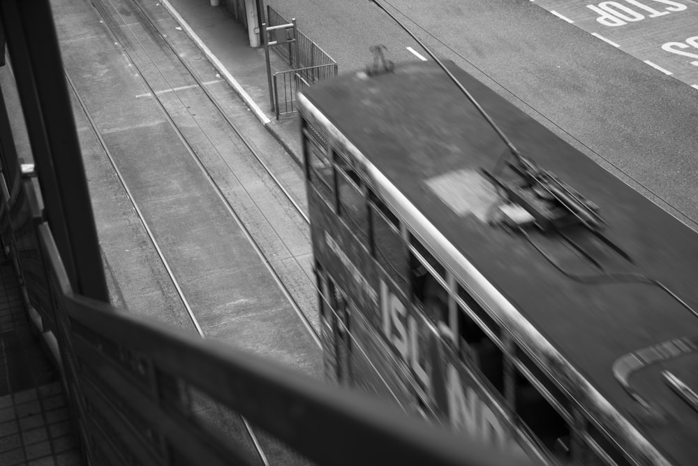 grayscale photo of a train station