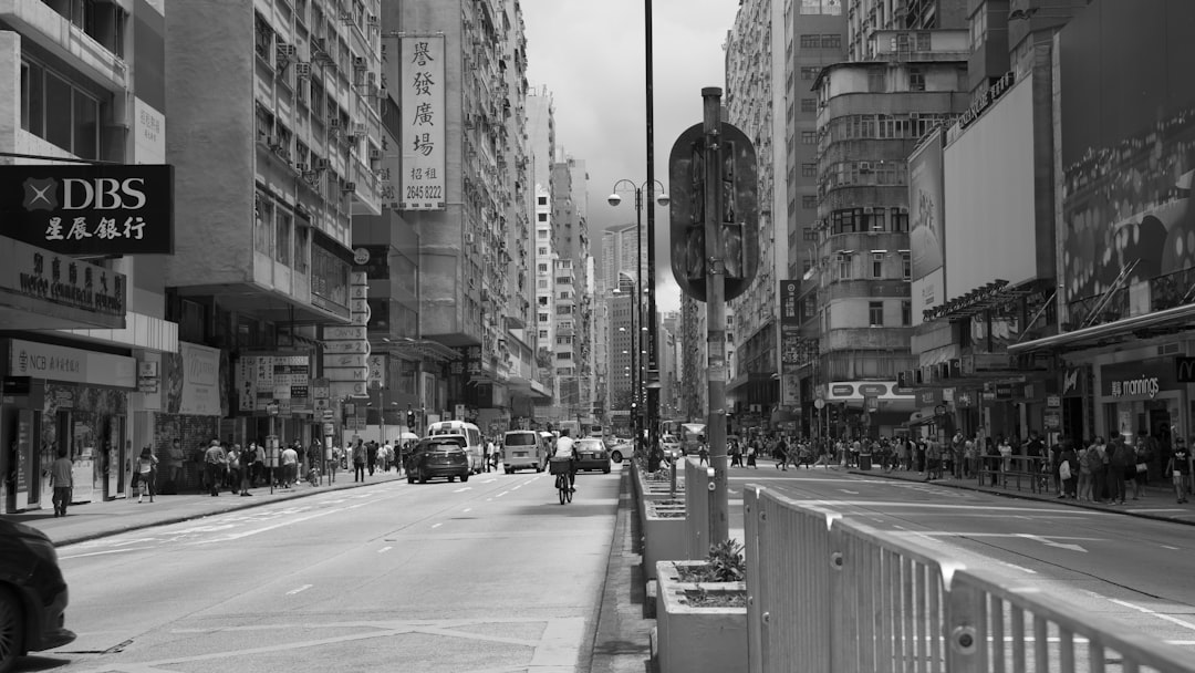 grayscale photo of cars on road