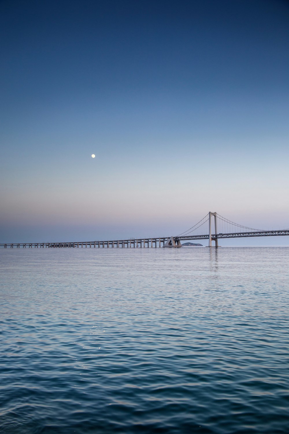 bridge over the sea during daytime